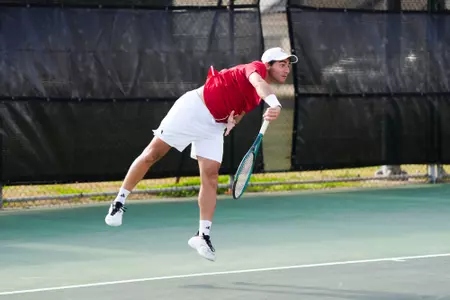 William Jade serve February 8, 2025 Louisiana vs. UT-Arlington Men’s Tennis at Cajun Courts in Lafayette, LA. Final score Louisiana 4 UTA 1. Photo by Benjamin R. Massey/Ragin’ Cajuns Athletics