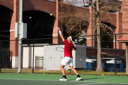 Oriol Fillat Gimenez serve February 8, 2025 Louisiana vs. UT-Arlington Men’s Tennis at Cajun Courts in Lafayette, LA. Final score Louisiana 4 UTA 1. Photo by Benjamin R. Massey/Ragin’ Cajuns Athletics
