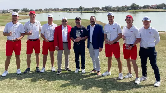 Louisiana head coach Theo Sliman and the Ragin' Cajuns after winning the 2025 Border Olympics