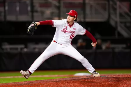 Chase Morgan pitching February 21, 2025 Louisiana vs Nebraska Baseball in Russo Park at M.L. "Tigue" Moore Field. Final Score Louisiana 1 OPPONENT 6. Photo by Benjamin R. Massey/Ragin’ Cajuns Athletics