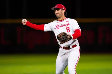 Lee Amedee fielding February 21, 2025 Louisiana vs Nebraska Baseball in Russo Park at M.L. "Tigue" Moore Field. Final Score Louisiana 1 OPPONENT 6. Photo by Benjamin R. Massey/Ragin’ Cajuns Athletics