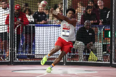 Oliver Jack competes in the weight throw at the SBC Indoor Championships