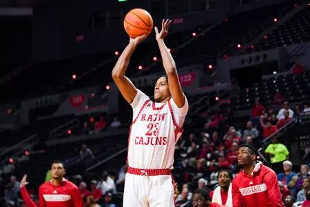 Kyran Ratliff shoots a jumper against Arkansas State