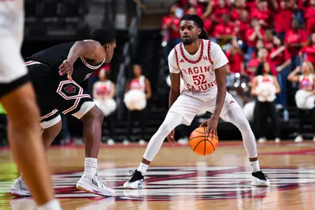 Michael Thomas dribbles February 26, 2025 Louisiana vs Arkansas State Men's Basketball in Lafayette, LA at the Cajundome. Final score Louisiana 64 ASU 83. Photo by Benjamin R. Massey/Ragin’ Cajuns Athletics