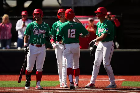 Caleb Stelly home run celebration March 16, 2025 Louisiana vs Troy Baseball Game 3 in Russo Park at M.L. "Tigue" Moore Field. Final Score Louisiana 18 Troy 14. Photo by Benjamin R. Massey/Ragin’ Cajuns Athletics