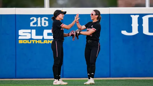SB Maddie Hayden and Erin Ardoin High-Five at McNeese 03.18.25