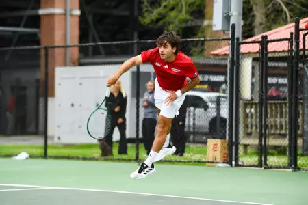 William Jade serve April 6, 2025 Louisiana vs. Troy Men’s Tennis at Cajun Courts in Lafayette, LA. Final score Louisiana 3 Troy 4. Photo by Benjamin R. Massey/Ragin’ Cajuns Athletics