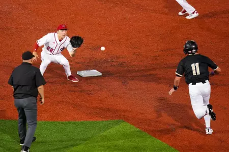 Owen Galt fielding tags out a runner March 29, 2025 Louisiana vs James Madison Baseball Game 2 in Russo Park at M.L. "Tigue" Moore Field. Final Score Louisiana 8 JMU 7. Photo by Benjamin R. Massey/Ragin’ Cajuns Athletics