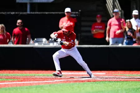 Maddox Mandino at bat bunt April 27, 2025 Louisiana vs Georgia Southern Game 3 Baseball in Russo Park at M.L. "Tigue" Moore Field. Final Score Louisiana 3 Georgia Southern 4. Photo by Benjamin R. Massey/Ragin’ Cajuns Athletics