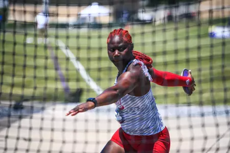 Kimola Hines throws the discus at the SBC Championships