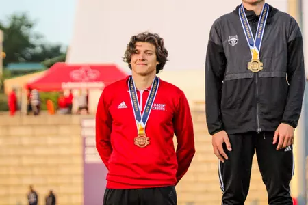 Teo Borgius stands on the podium for the pole vault
