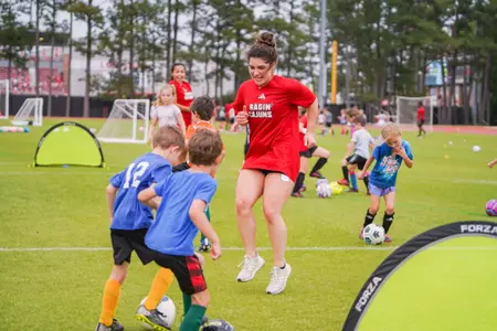 Sisley Stephens works with Kids during the Louisiana Soccer Kid's Clinic