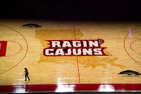 July 27, 2023 New floor for both the Men's and Women's Basketball is layed down for the first time in the Cajundome. Photo by Benjamin R. Massey/Ragin Cajun Athletics