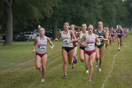 Ella Segura and Isabelle Russell run at the Battle of New Orleans
