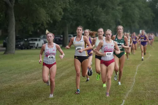 Ella Segura and Isabelle Russell run at the Battle of New Orleans