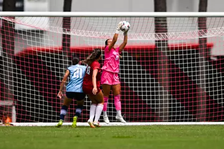Natalie Mayes makes a save against Rice