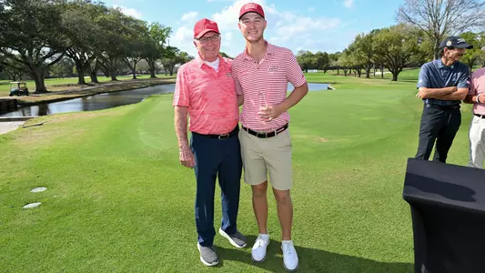 Malan Potgieter is joined by legendary UL golf coach Bob Bass after claiming his second consecutive title at the 41st Louisiana Classics