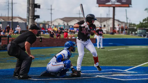 Rigoberto Hernandez looks to drive a pitch in Louisiana's midweek contest at McNeese State on March 31, 2026