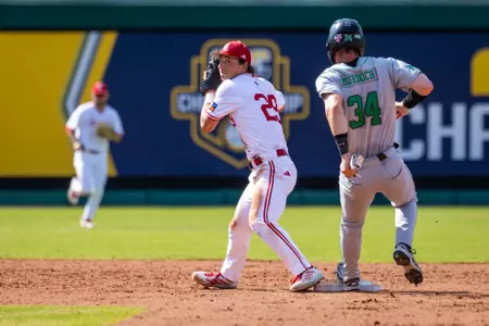 Louisiana shortstop Blaze Rodriguez attempts to turn a double play during the Cajuns' 11-1 win over Marshall in the opening round of the 2026 SBC Tournament at DABOS Park