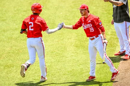 Donovan LaSalle (2) is greeted by Kasen Bellard (19) after his ninth inning home run in Louisiana's 12-6 win over Texas State on May 23, 2026 in the Sun Belt Conference Baseball Championship at Riddle-Pace Field in Troy, Ala.