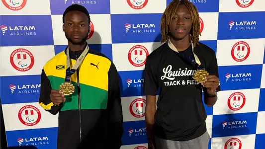 Mark Daley, Alaysha Veal display their gold medals claimed at the 2026 FISU America Games in Lima, Peru