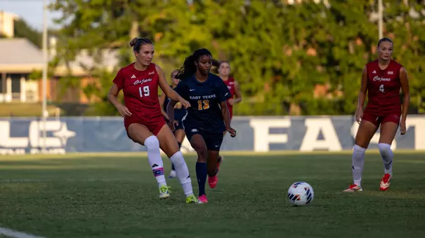 Sydney Byrnes fights for a ball against East Texas A&M's Lena Junior in Thursday's 3-3 draw in Commerce, Texas