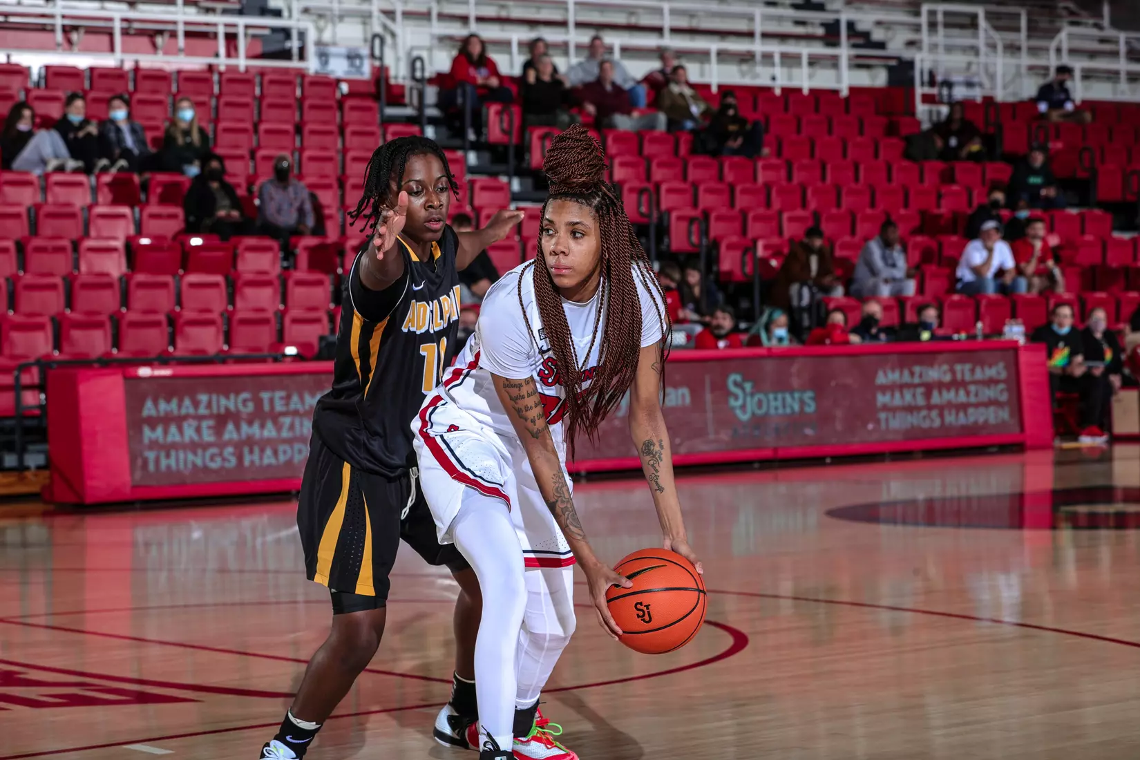 The St. John's women's basketball team defeated Adelphi, 93-58, in exhibition action.
