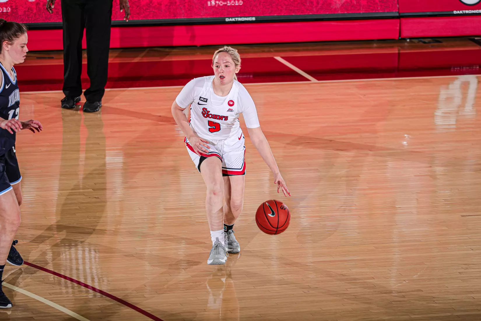 Zabrecky sets up a play at the top of the key