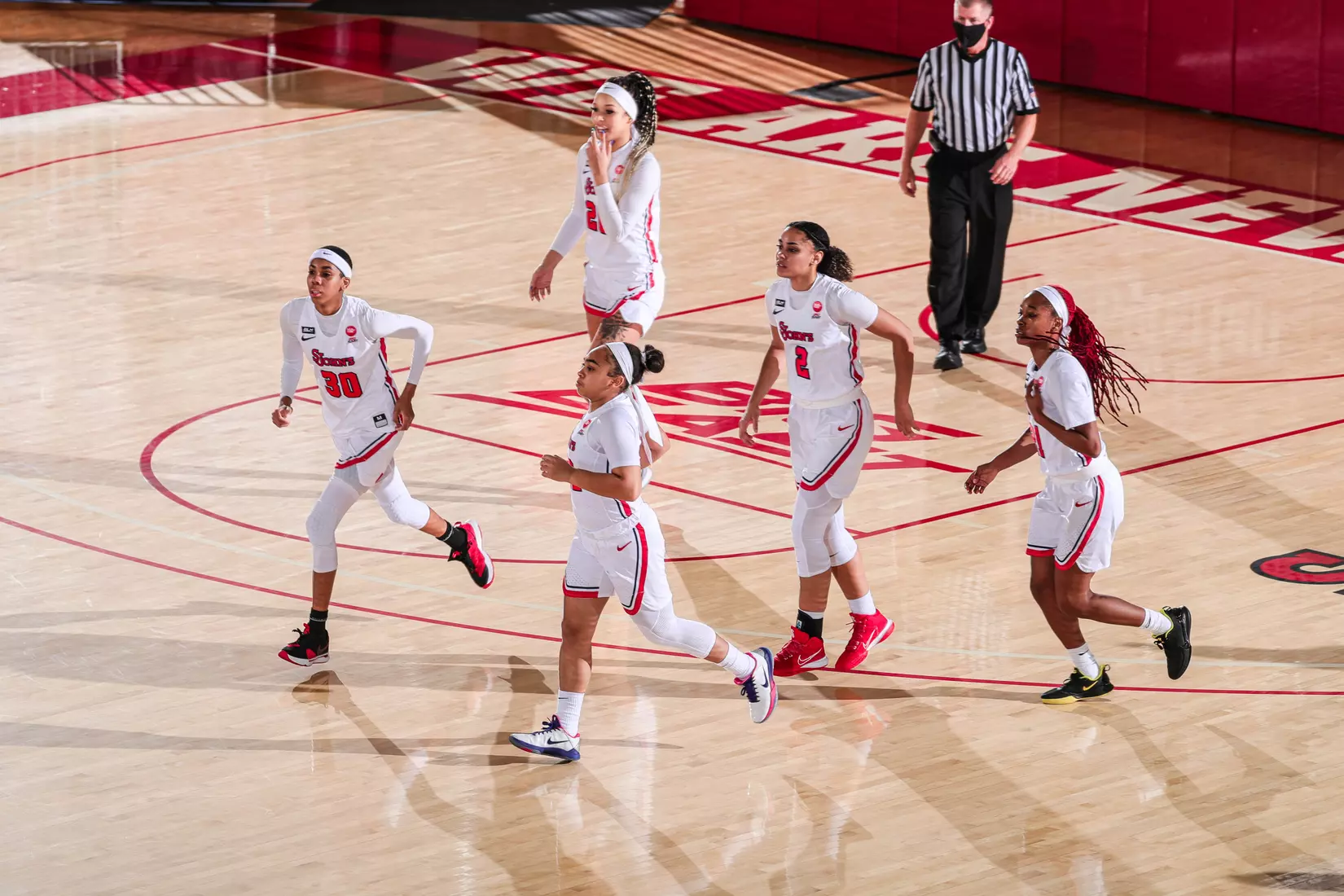 St. John's walks back on the court following a timeout.
