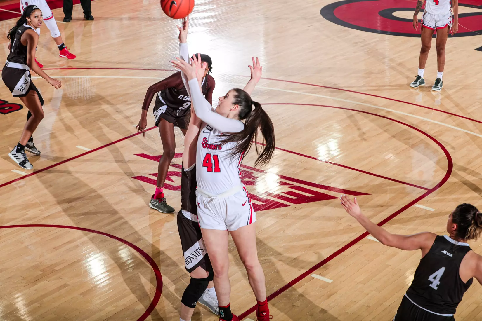 Emma Nolan takes it to the rim and sinks the layup.