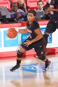 Senior Nadirah McKenith takes the ball up the floor on Senior Night, a 67-54 win over DePaul.