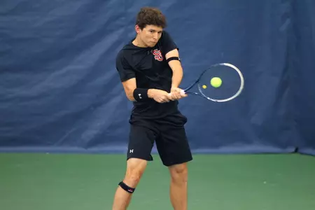 Freshman Robert Livi clinched the match with a three-set win at fourth singles.