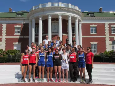 Athletes from St. John's and Hofstra pose in front of the Bourne Mansion on St. John's University's Oakdale campus following last year's SJU-Hofstra Fall XC Festival.