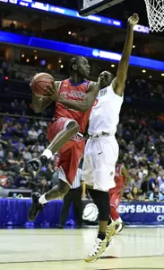 Sir'Dominic Pointer drives to the basket against San Diego State Aztecs forward Skylar Spencer.
