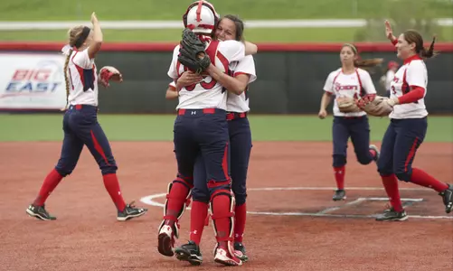 Tori Free and Erin Burner celebrate after clinching a spot in the 2015 BIG EAST Championship.