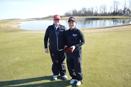 Head coach Ambry Bishop with Sr. Anna Kim.