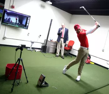 Freshman Seung Yub Baek demonstrates the equipment and technology featured in the facility.