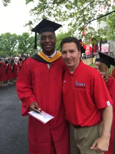 Men's Basketball player Christian Jones with Eric Rienecker, Director of Academic Support Services for Student-Athletes