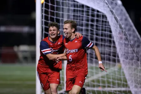 Matt Forster and Alistair Johnston celebrate the team's third goal of the night