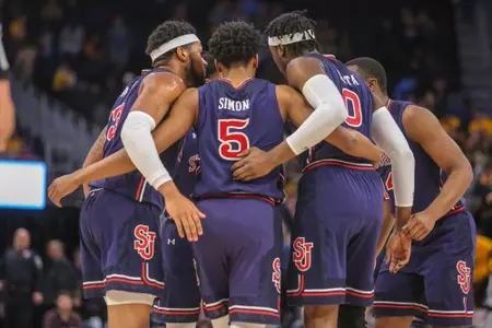 Players Huddle in Game