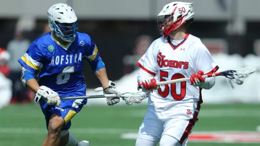Ryan Schaeffer (50) sets up in the offensive zone against No. 19/18 Hofstra at DaSilva Memorial Field