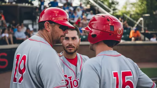 Assistant Coach Mike Hampton talks to Peter Abinanti and Carson Bartels
