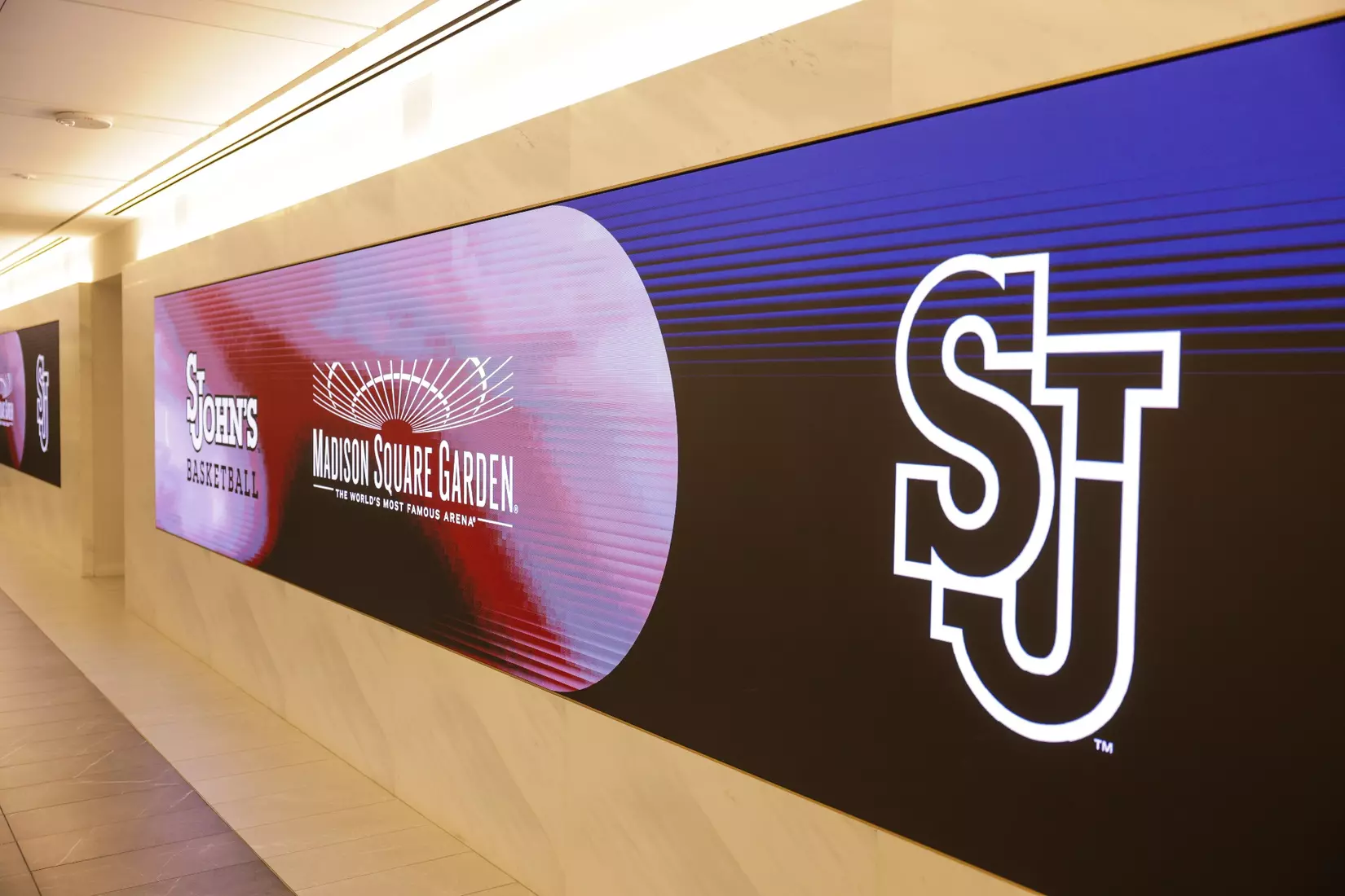 The St. John's men's basketball team rings The Opening Bell at the New York Stock Exchange on Tuesday.