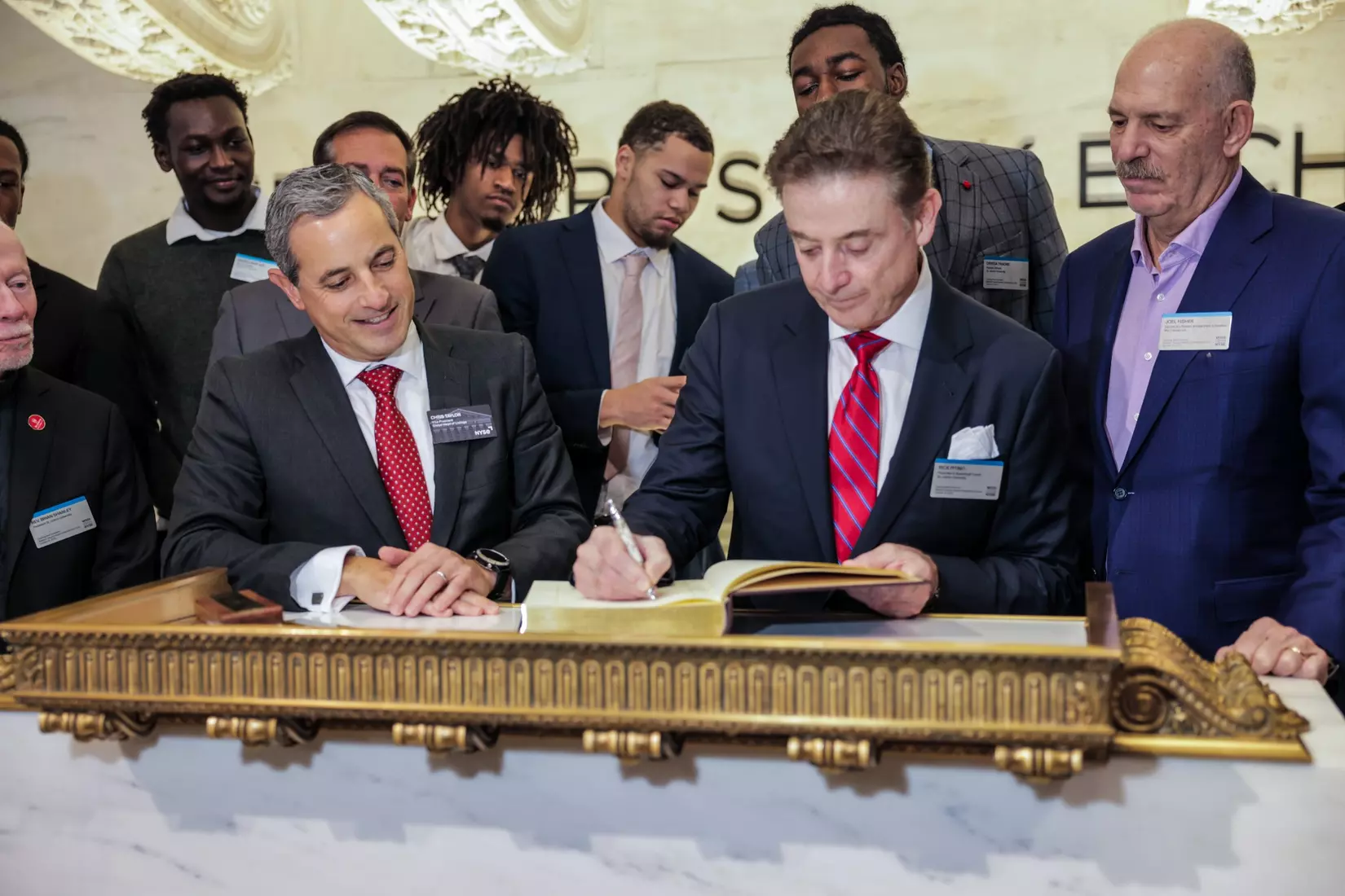 The St. John's men's basketball team rings The Opening Bell at the New York Stock Exchange on Tuesday.