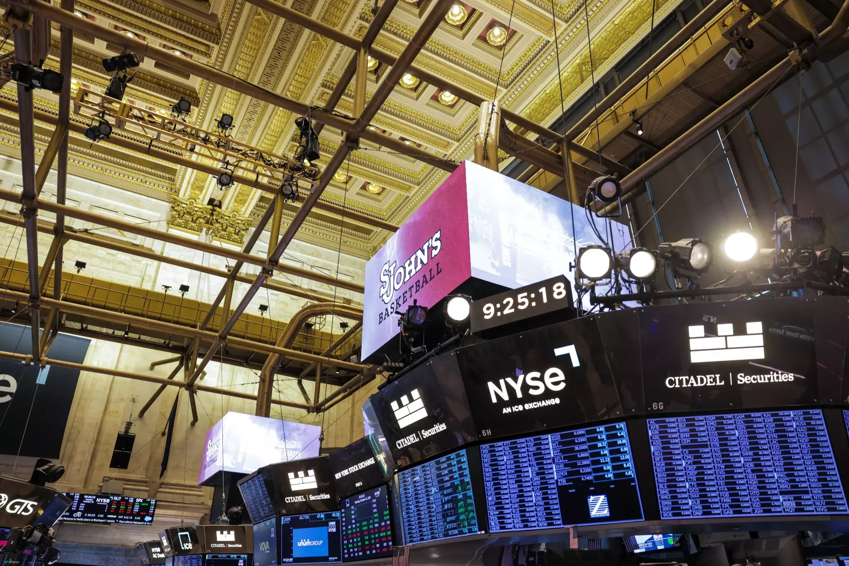 The St. John's men's basketball team rings The Opening Bell at the New York Stock Exchange on Tuesday.
