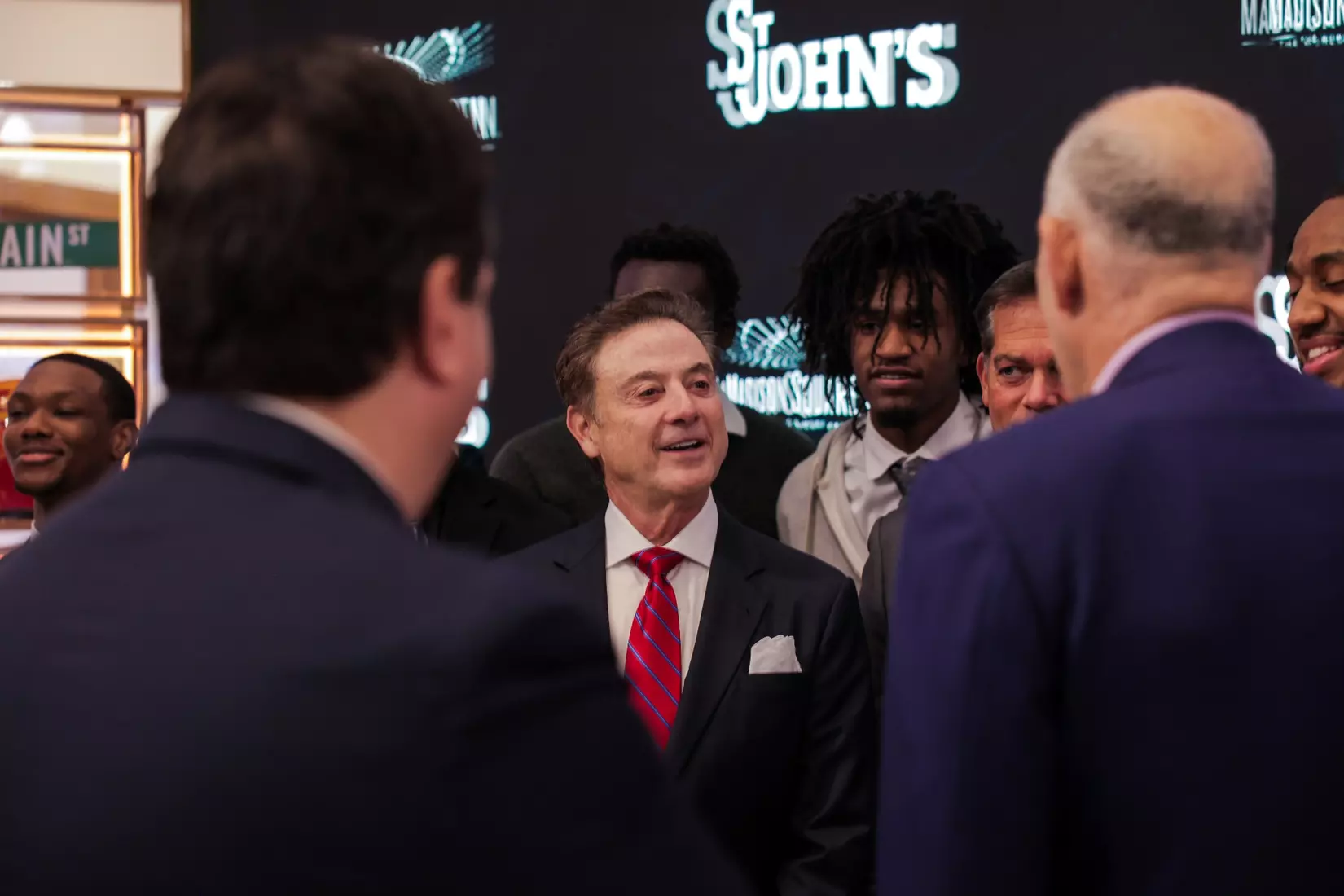 The St. John's men's basketball team rings The Opening Bell at the New York Stock Exchange on Tuesday.