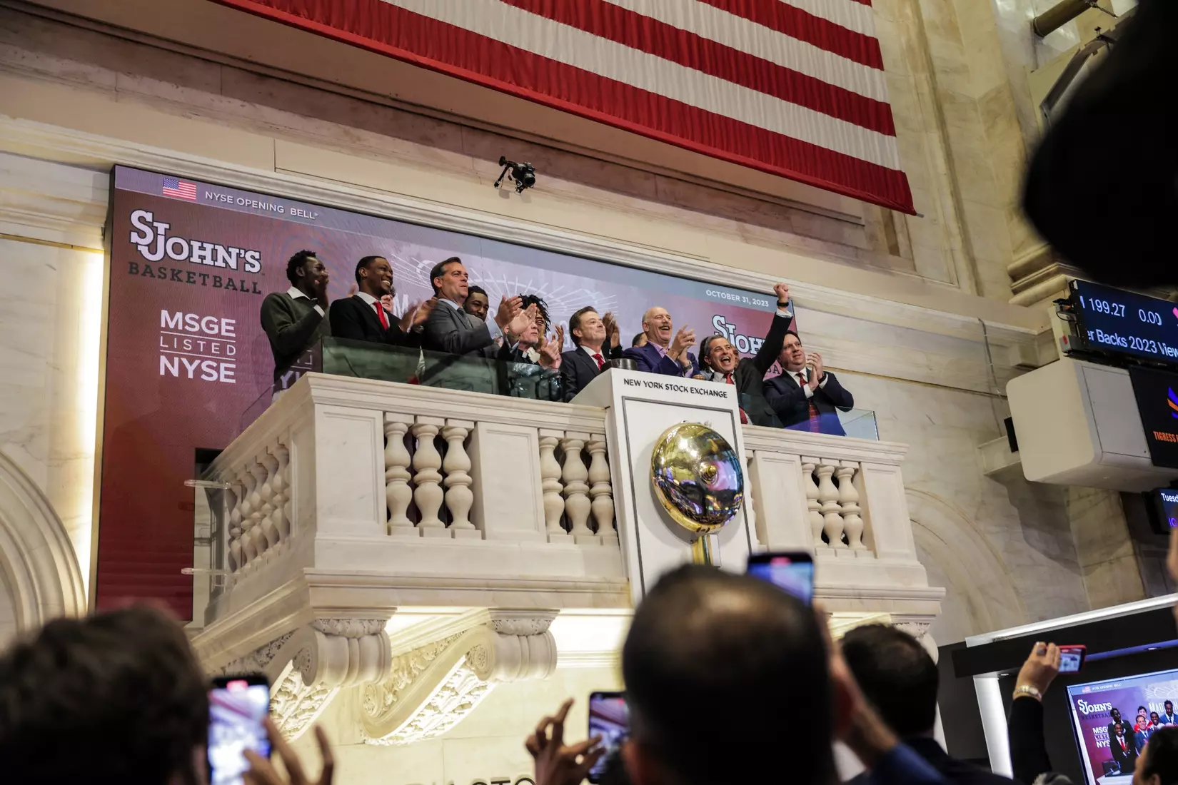 The St. John's men's basketball team rings The Opening Bell at the New York Stock Exchange on Tuesday.