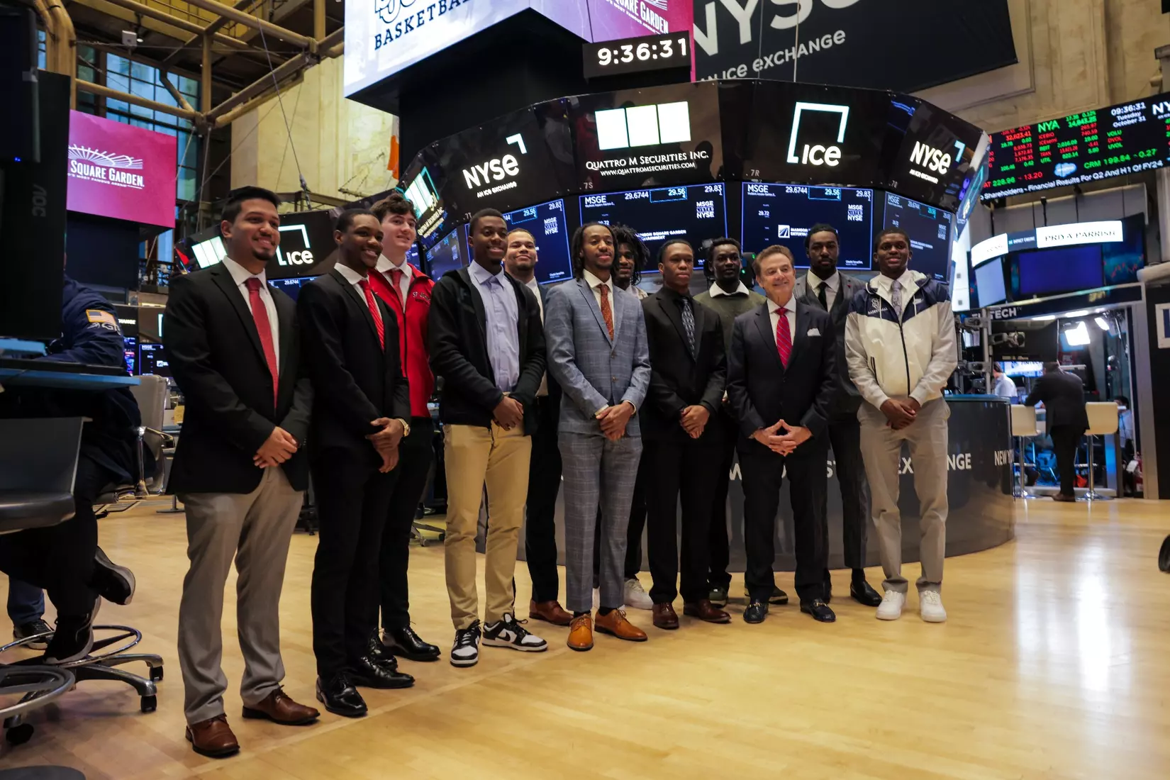 The St. John's men's basketball team rings The Opening Bell at the New York Stock Exchange on Tuesday.