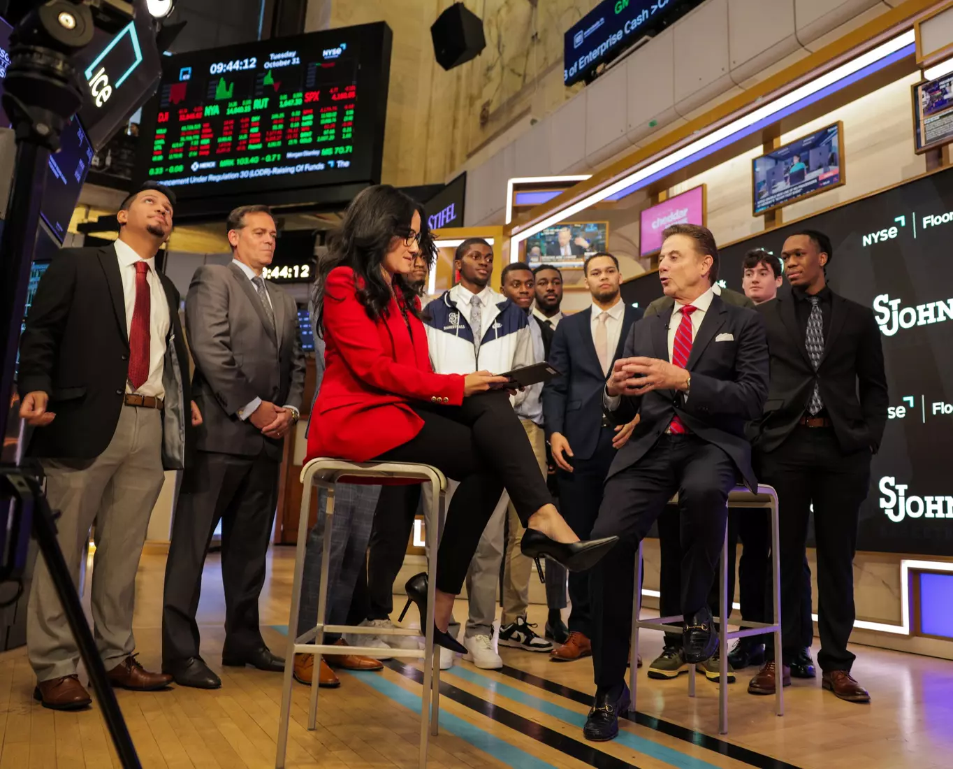 The St. John's men's basketball team rings The Opening Bell at the New York Stock Exchange on Tuesday.