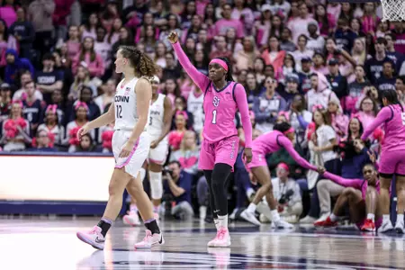 Unique Drake celebrates a made three-pointer.